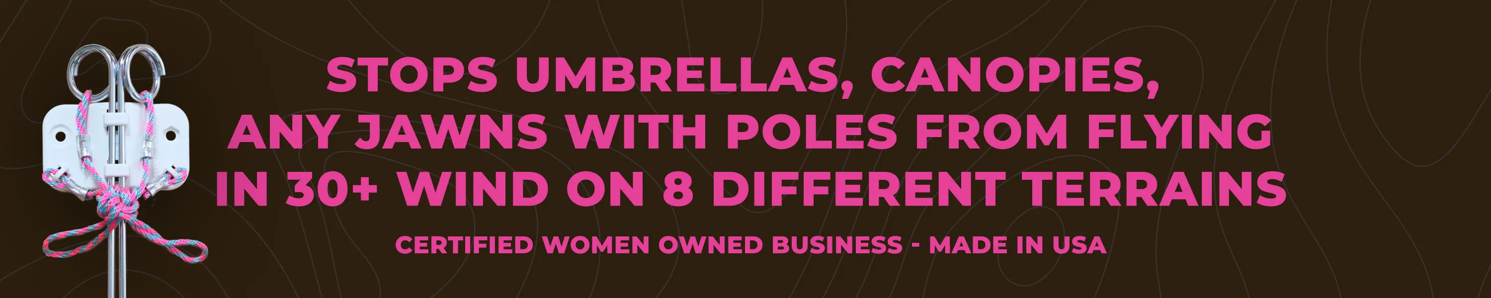 White metal device with pink and blue cords, alongside text stating it stops umbrellas, canopies, and poles from flying in 30+ mph wind on 8 terrains, certified women-owned business made in USA.
