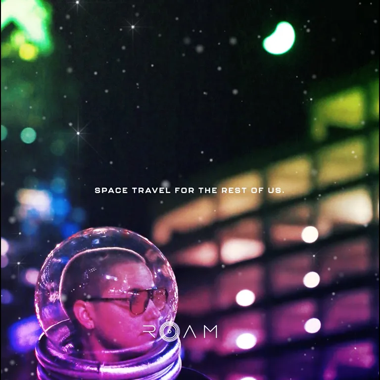 Person wearing a transparent space helmet with a city background and text 'Space travel for the rest of us' and 'ROAM' logo.